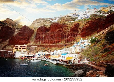 Amoudi bay, port of Oia, Santorini Greece, retro toned