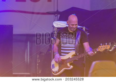 Minsk Belarus-August 12 2017: Bass Guitarist and Contrabass Player Makrus Bodenseh of World Renowned Jazz Ensemble De-Phazz Performing at A-Fest Music Festival on August 12 2017 in Minsk Republic of Belarus.