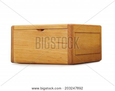 Close-up of a light brown wooden box container isolated on a white background. A closed empty natural crate for storage. A rustic antique box for keeping small items. Cargo delivery and shipment.