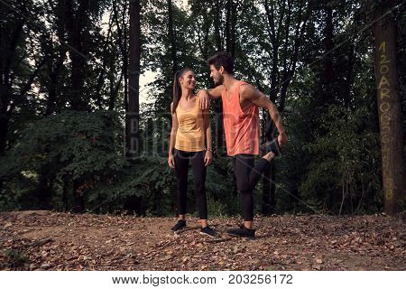 Man Woman, Friends, Two Young People Leisure, Outdoors Forest Nature Trees, Stetching Legs, Smiling