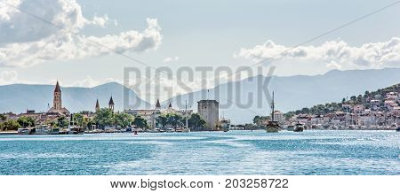 Panoramic photo of the old town Trogir and Ciovo island with harbor. Summer vacation. Travel destination.