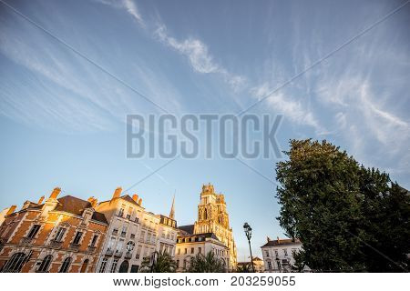 Sunset view on the old town with saint Croix cathedral in Orleans city in France. Wide angle view with copy space
