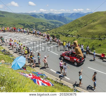 Col de PeyresourdeFrance- July 23 2014: Kleber vehicle passing in the Publicity Caravn on the road to Col de Peyresourde in Pyrenees Mountains during the stage 17 of Le Tour de France 2014.