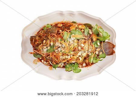 Fried Nile Tiapia with spicy salad topping