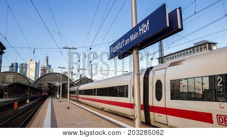 FRANKFURT GERMANY - JUL 11 2013: Train leaving the Frankfurt Central Train Station. With about 350000 passengers per day the station is the most frequented railway station in Germany.