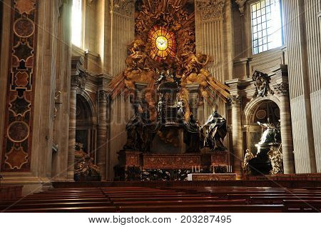 St. Peters Basilica,Vatican Rome Italy,November 6th 2010.The Throne of St.Peter at the Vatican in Rome Italy.The relic is enclosed in a sculptured gilt bronze casing designed by Bernini.Come enter St.Peters ans be absolutely amazed.
