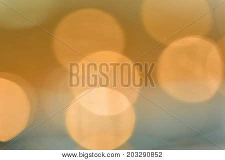 Abstract multicolored circles. Yellow lights garlands background