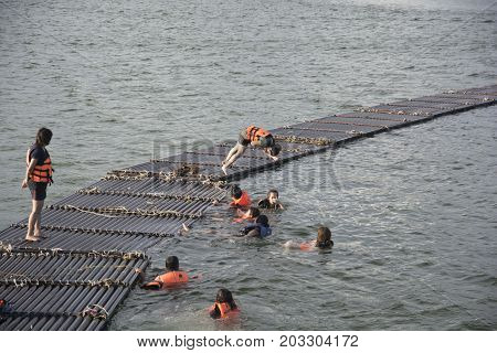 September 04, 2017 : Tourists Floating On The River By Wooden Raft In Srinakarin Dam, Kanchanaburi,