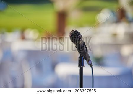 microphone close up on stage in the evening