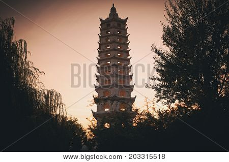 Vietnamese buddhist temple. Red lanterns and pagoda
