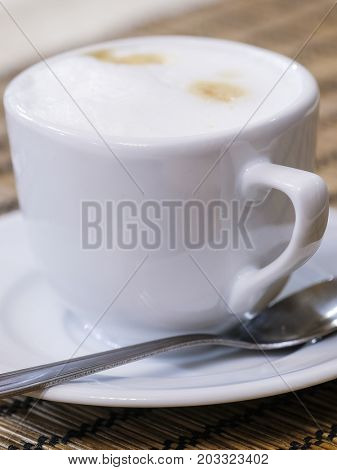 Cup of a coffee on a table