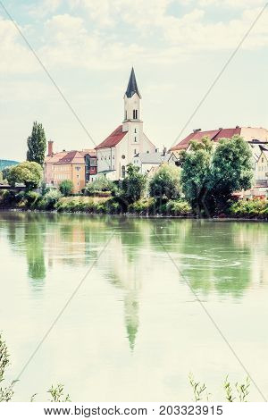 Saint Gertraud church in Passau Germany. Cultural heritage. Religious architecture. Beautiful place. Old houses. Architectural theme. Beauty photo filter.