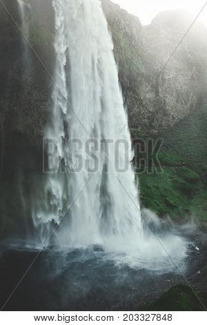 famous Seljalandsfoss waterfall in southern Iceland. treking in Iceland. Travel and landscape photography concept