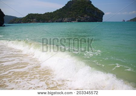 Big wave on a beach, Krabi, Thai vacations