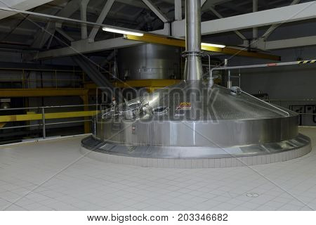 ST. PETERSBURG, RUSSIA - AUGUST 11, 2016: Brewing boilers in the Heineken brewery. It was the first Heineken brewery in Russia, and now it can produce over 5 millions HL of beer per year