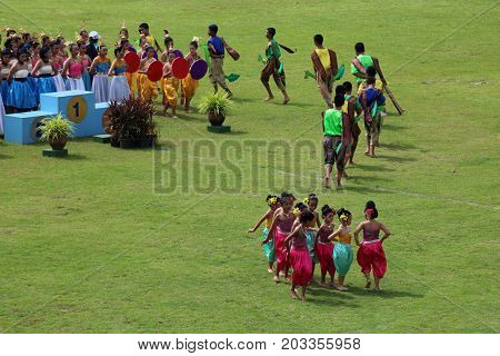 Thai dance performances of students in the stadium Darunothai School Trang Thailand August 19 2016.