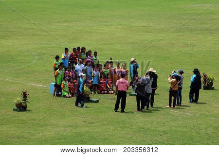 Thai dance performances of students in the stadium Darunothai School Trang Thailand August 19 2016
