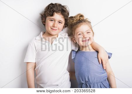Happy Brother and Sister Hugging each other