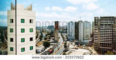 Casablanca Morocco. Aerial view of skyscrapers in Casablanca Morocco during the sunny day. Car traffic on the road construction sites.