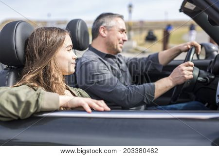 A Father On Car Journey With Teenage daughter