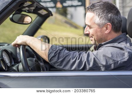 A Father On Car Journey With Teenage daughter
