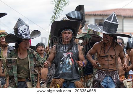 June 29 2017 Cotacachi Ecuador: kichwa indigenous people dancing on the street during Inti Raymi festival