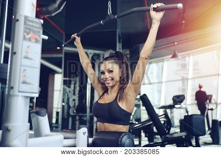 Sexy Athletic Young Girl Training Back In Gym