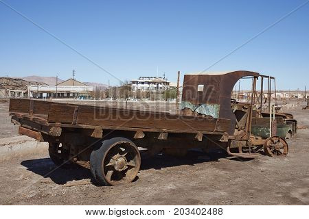 Chacabuco, Antofagasta Region, Chile - August 19, 2017: Abandoned vehicle in the derelict nitrate mining town of Chacabuco in the Atacama Desert of northern Chile