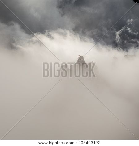 Mountain Peak In The Clouds