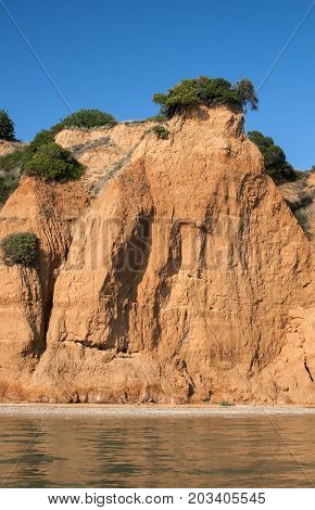 Effects of seaside coastal erosion with clayey soil