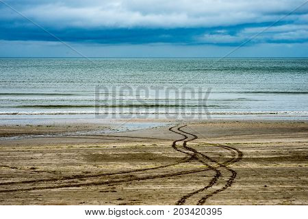 View of Beach on overcast rainy day in Bettystown, Ireland