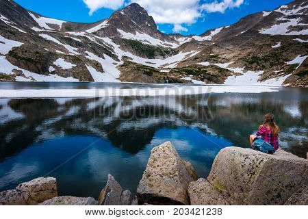 Tourist In Colorado Hiker Girl Rests At Blue Lake