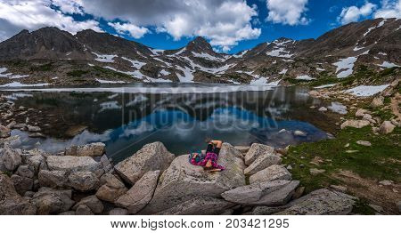 Tourist In Colorado Hiker Girl Rests At Blue Lake