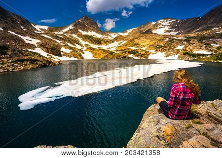 Tourist In Colorado Hiker Girl Rests At Blue Lake