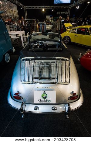 MAASTRICHT NETHERLANDS - JANUARY 08 2015: The sports car Porsche 356B. Rear view. International Exhibition InterClassics & Topmobiel 2015