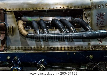 MAASTRICHT NETHERLANDS - JANUARY 08 2015: The exhaust pipe of a British sports car Invicta S-Type 1931. International Exhibition InterClassics & Topmobiel 2015