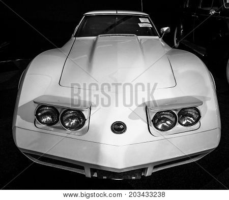 MAASTRICHT NETHERLANDS - JANUARY 08 2015: Sports car Chevrolet Corvette (C3) Stingray. Black and white. International Exhibition InterClassics & Topmobiel 2015