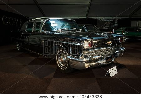 MAASTRICHT NETHERLANDS - JANUARY 08 2015: Full-size luxury car Cadillac series 75 Fleetwood Limousine Imperial Sedan by Derham 1958. International Exhibition InterClassics & Topmobiel 2015