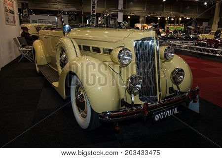 MAASTRICHT NETHERLANDS - JANUARY 08 2015: Oldtimer Packard 120 Convertible Sedan with Dietrich Body 1937. International Exhibition InterClassics & Topmobiel 2015