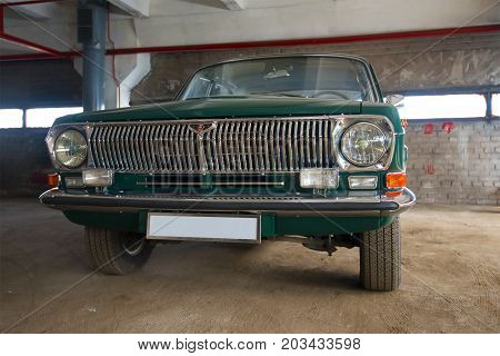 SAINT PETERSBURG, RUSSIA - MAY 17, 2017: Classic Soviet car Volga GAZ-24 in the parking lot closeup