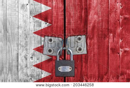 Bahrain flag on door with padlock close