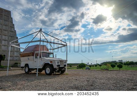 SANTO DOMINGO, DOMINICAN REPUBLIC - CIRCA 2015: PAPAMOBILE OF JOHN PAUL II STANDING NEXT TO THE COLUMBUS LIGHTHOUSE