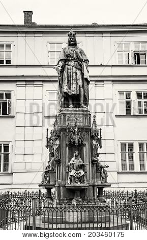 Old statue of Charles IV Prague Czech republic. Architectural theme. Black and white photo.