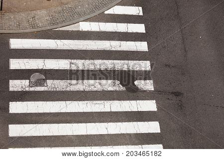 Safety on traffic concept. Urban city pedestrian zebra crossing view from top.