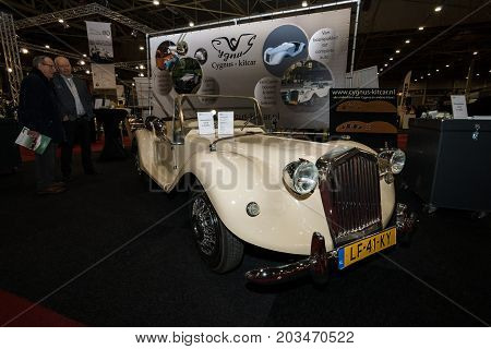MAASTRICHT NETHERLANDS - JANUARY 09 2015: Modern car in retro style Cygnus Kitcar built on the basis of the Citroen 2CV 2001. International Exhibition InterClassics & Topmobiel 2015