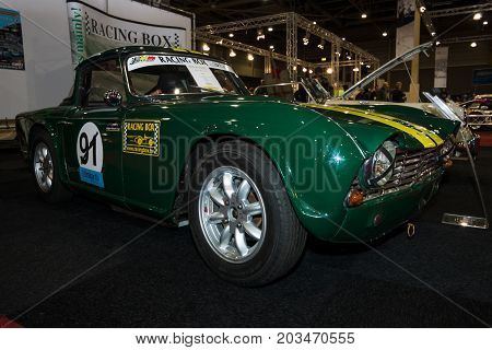 MAASTRICHT NETHERLANDS - JANUARY 09 2015: Racing car Triumph TR4 1963. International Exhibition InterClassics & Topmobiel 2015