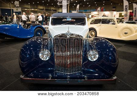 MAASTRICHT NETHERLANDS - JANUARY 09 2015: British two-door sports saloon Jaguar Mk IV 35 litre Drop Head Coupe Vanden Plas 1947. International Exhibition InterClassics & Topmobiel 2015