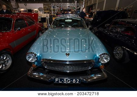 MAASTRICHT NETHERLANDS - JANUARY 09 2015: Sports car Volvo P1800ES 1973. International Exhibition InterClassics & Topmobiel 2015