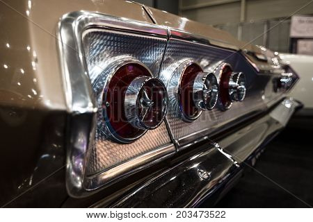 MAASTRICHT NETHERLANDS - JANUARY 09 2015: The stop lights Chevrolet Impala SS Convertible 1963. International Exhibition InterClassics & Topmobiel 2015