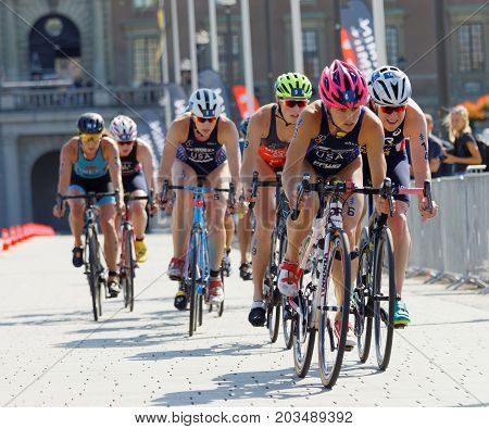 STOCKHOLM - AUG 26 2017: Group of female triathlete cyclists in the Women's ITU World Triathlon series event August 26 2017 in Stockholm Sweden